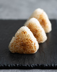 Close-up of sushi on cutting board