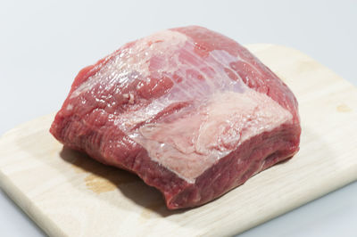 Close-up of meat on cutting board