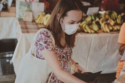 Series photo of young woman travel and shopping in street market , chiang mai north of thailand