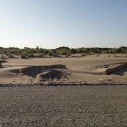 Scenic view of desert against clear sky