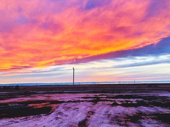 Scenic view of dramatic sky during sunset