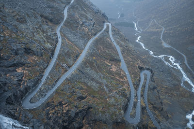 High angle view of road amidst rocks