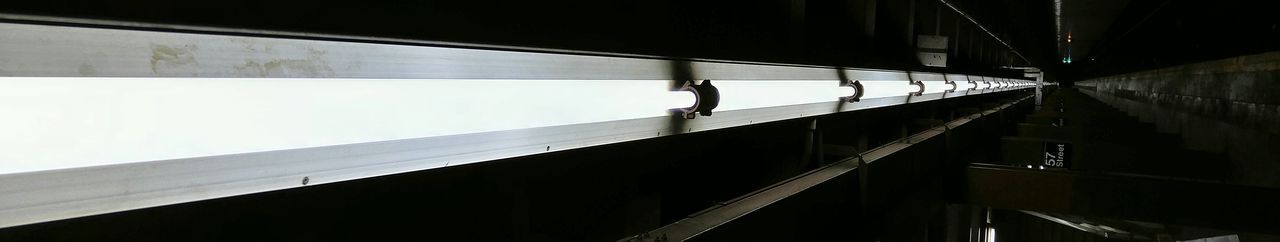 Man walking on railing