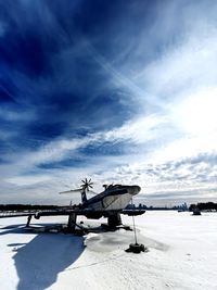 Airplane on snow covered landscape