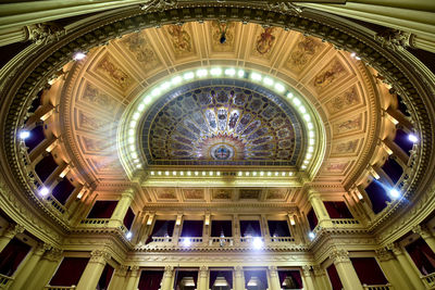 Low angle view of illuminated ceiling of building