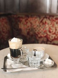 Close-up of coffee cup on table