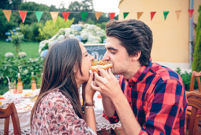 Young couple eating food