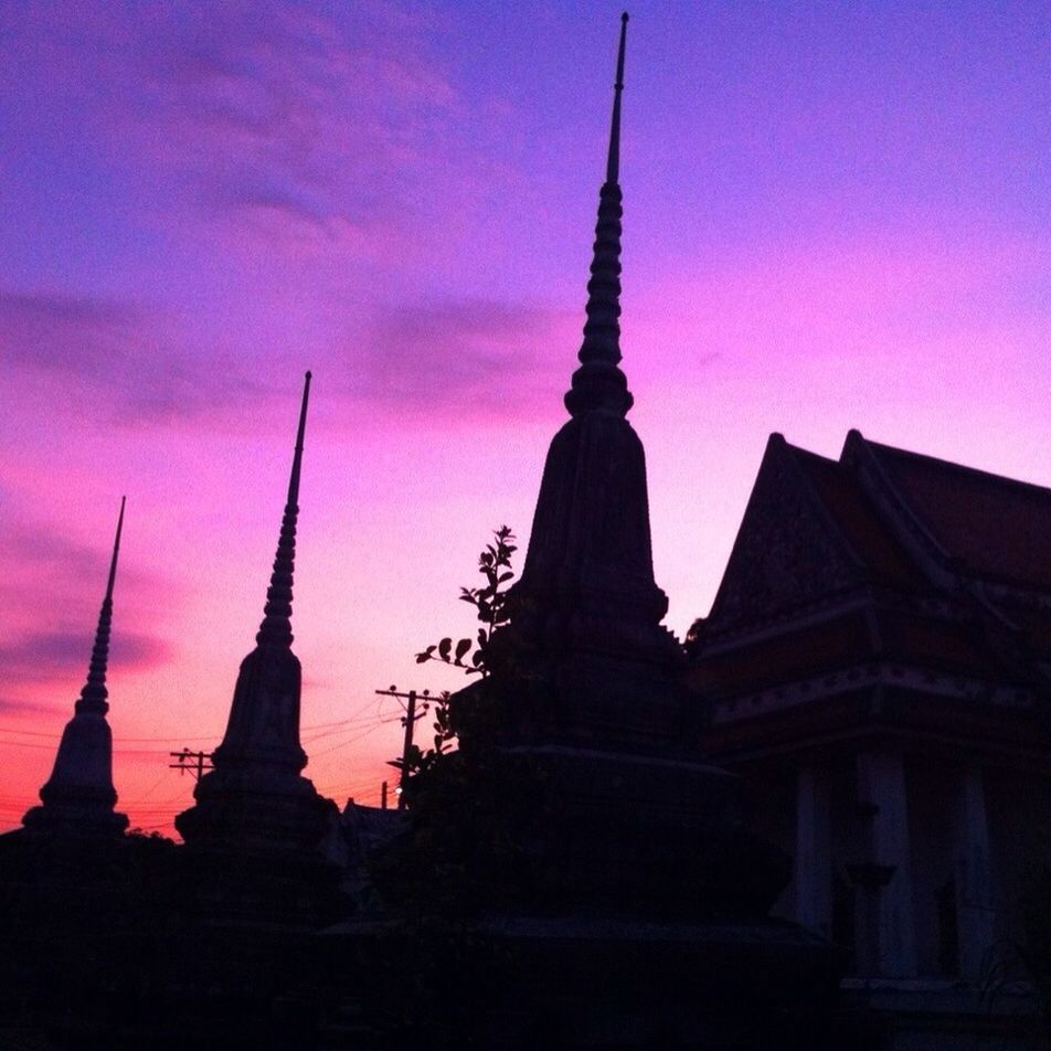 sunset, architecture, built structure, silhouette, building exterior, famous place, sky, place of worship, religion, travel destinations, international landmark, tourism, travel, spirituality, dusk, low angle view, spire, tower, cloud - sky, orange color