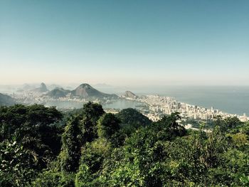 Scenic view of mountains against blue sky