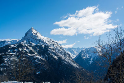 Scenic view of snowcapped mountains against sky