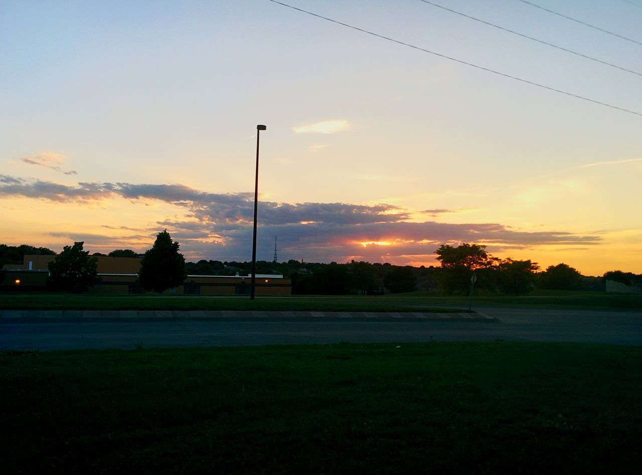 sunset, tree, sky, cable, grass, nature, silhouette, no people, beauty in nature, cloud - sky, scenics, outdoors, electricity pylon, technology, day