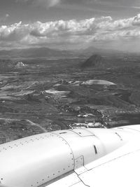 Aerial view of sea against cloudy sky