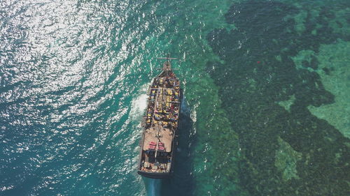 High angle view of sailboat sailing on sea