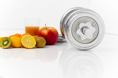 Close-up of fruits in glass container