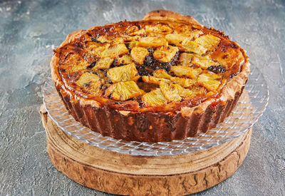 Winter torte with apricots, plums, bananas and pineapple. french gourmet cuisine