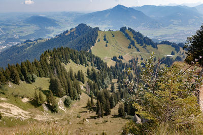 Scenic view of landscape and mountains against sky