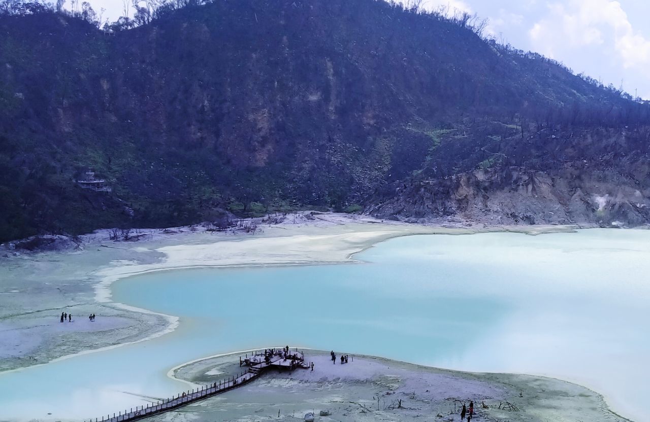 VIEW OF SWIMMING POOL AGAINST MOUNTAIN