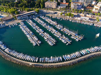 Aerial view of boats moored at harbor