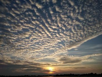 Scenic view of dramatic sky during sunset