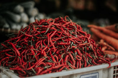 Red chili peppers for sale in market