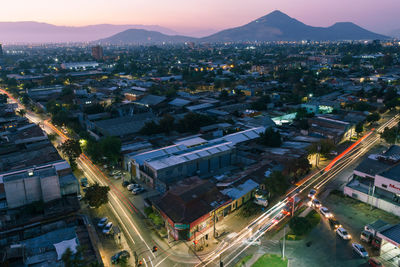 High angle view of street amidst buildings in city