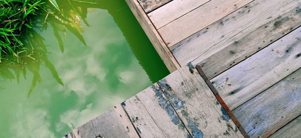 High angle view of pier against blue wall