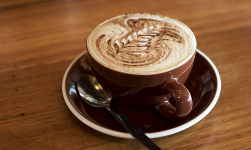 Coffee cup on table