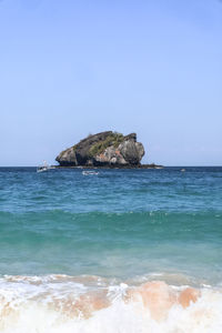Scenic view of sea against clear sky