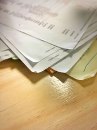 High angle view of paper on table