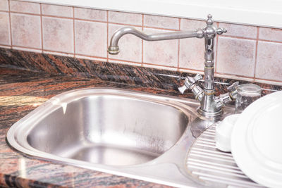 Faucet on sink in kitchen