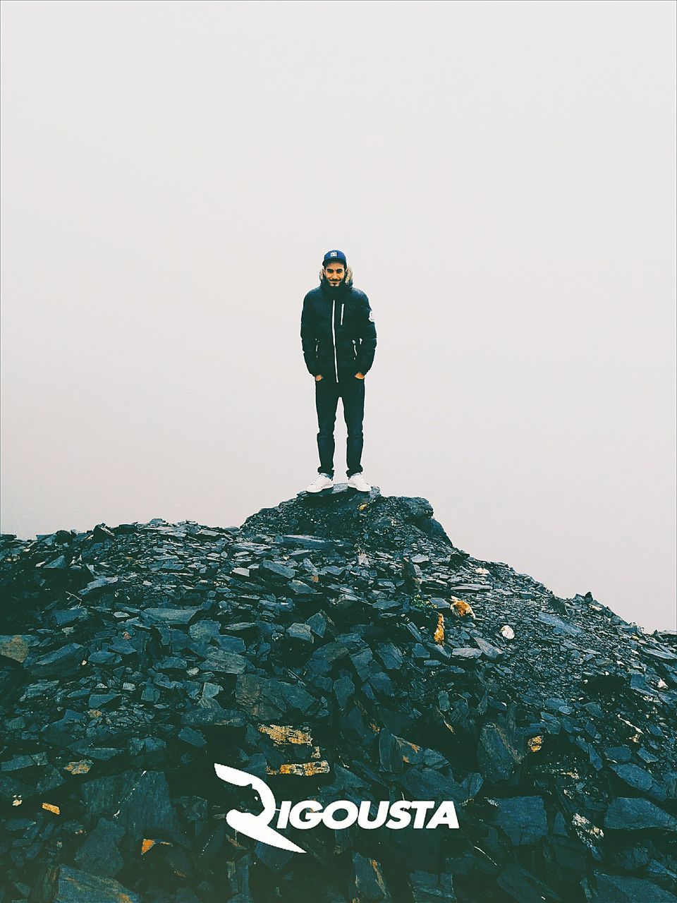 FULL LENGTH OF MAN STANDING AGAINST SKY