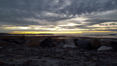 Scenic view of landscape against sky during sunset