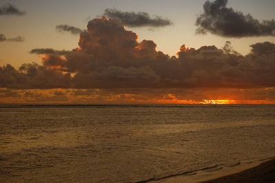 Scenic view of sea against sky at sunset