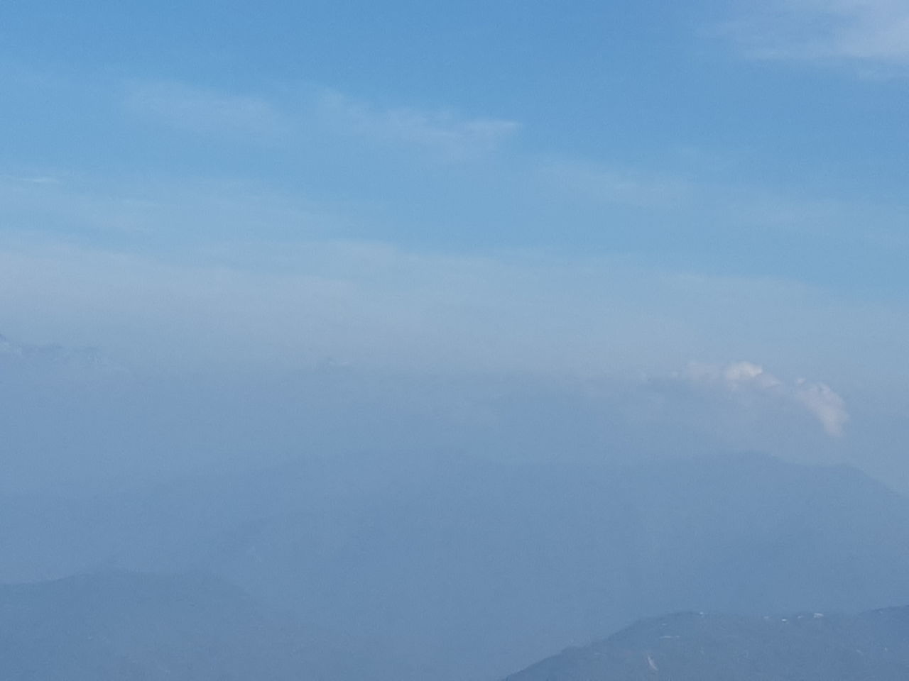 LOW ANGLE VIEW OF MOUNTAIN RANGE AGAINST SKY