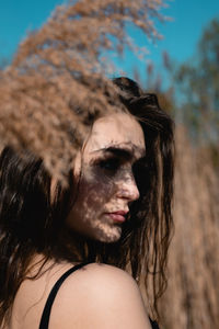 Close-up portrait of young woman