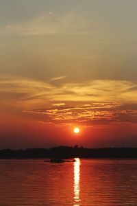 Scenic view of sea at sunset