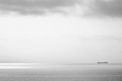 Scenic view of calm sea against sky