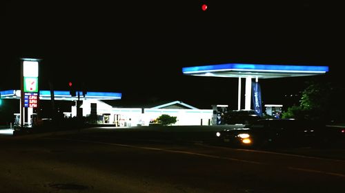 Illuminated road at night