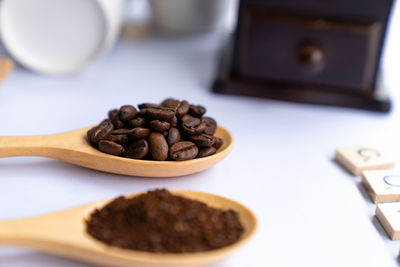 Close-up of coffee beans on table