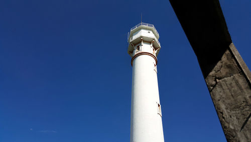 Low angle view of lighthouse against clear sky