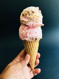 Hand holding ice cream