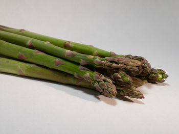 Close-up of food on table against white background