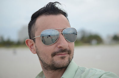 Portrait of young man wearing sunglasses