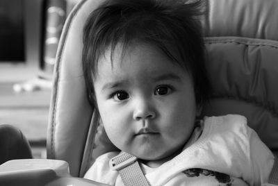 Portrait of cute baby at home