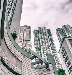 Low angle view of buildings against sky in city