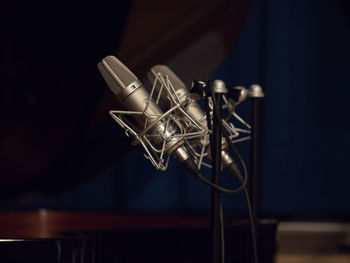 Close-up of microphones at recording studio