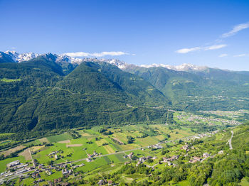 Scenic view of landscape and mountains against sky