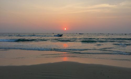 Scenic view of sea at sunset