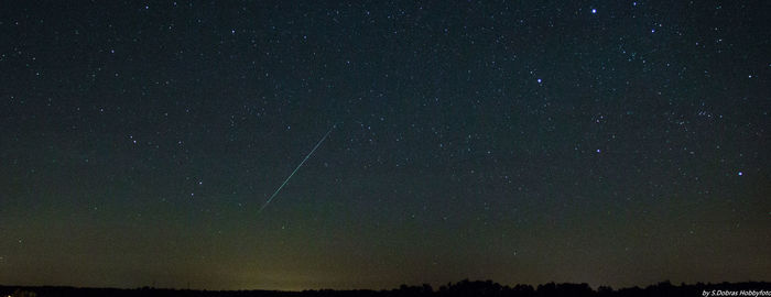Low angle view of stars against sky at night