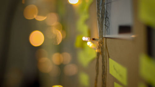 Defocused image of illuminated lights at night